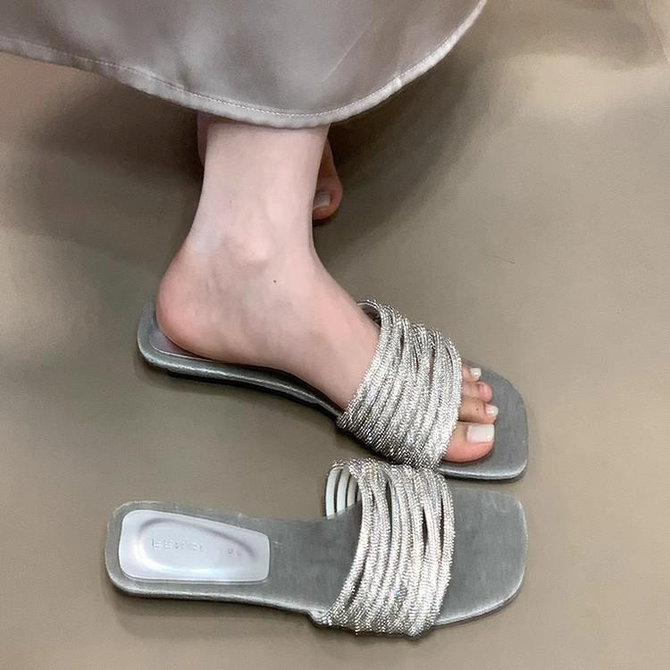 Fashion one-word slippers women's 2025 summer new outer wear lazy rhinestones with low heels open-toed sandals high sense