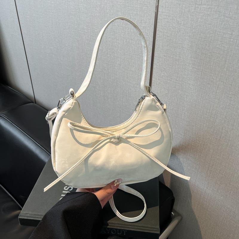 Niche Bow Hand Carry Crescent Moon Bag Women's 2025 New Fashion Simple Shoulder Armpit Bag Shoulder Messenger Bag