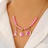 Breast Cancer Awareness Necklace & AIDS Prevention Bracelet with Red Ribbon Badge