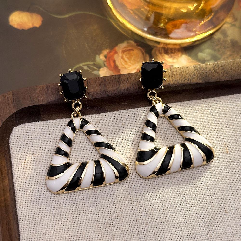 Elegant Gold-Plated Black Zircon Stud Earrings - Niche Design for a Luxurious Fashion Statement