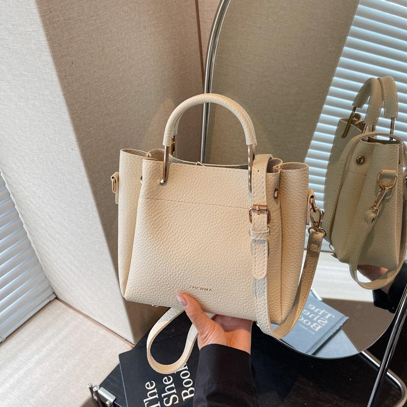 

Популярная маленькая сумка женская новая нишевая дизайнерская простая сумка-мессенджер портативная сумка-ведро бежевый