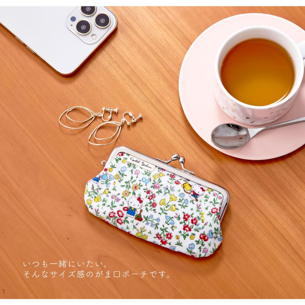 Bonito y elegante mini neceser con un personaje de Hello Kitty y Sanrio con un diseño de estampado floral Liberty Made in Primrose Meadow, patrón. Japón.