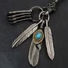 Distinctive Feather Keychain Charm In Antique Silver With Turquoise for Individualistic Fashion Statements Pieces