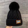 Winter plush wool cap thickened warm Northeast knitted hat women's big head circumference ear protectors hairball hat white ball cap