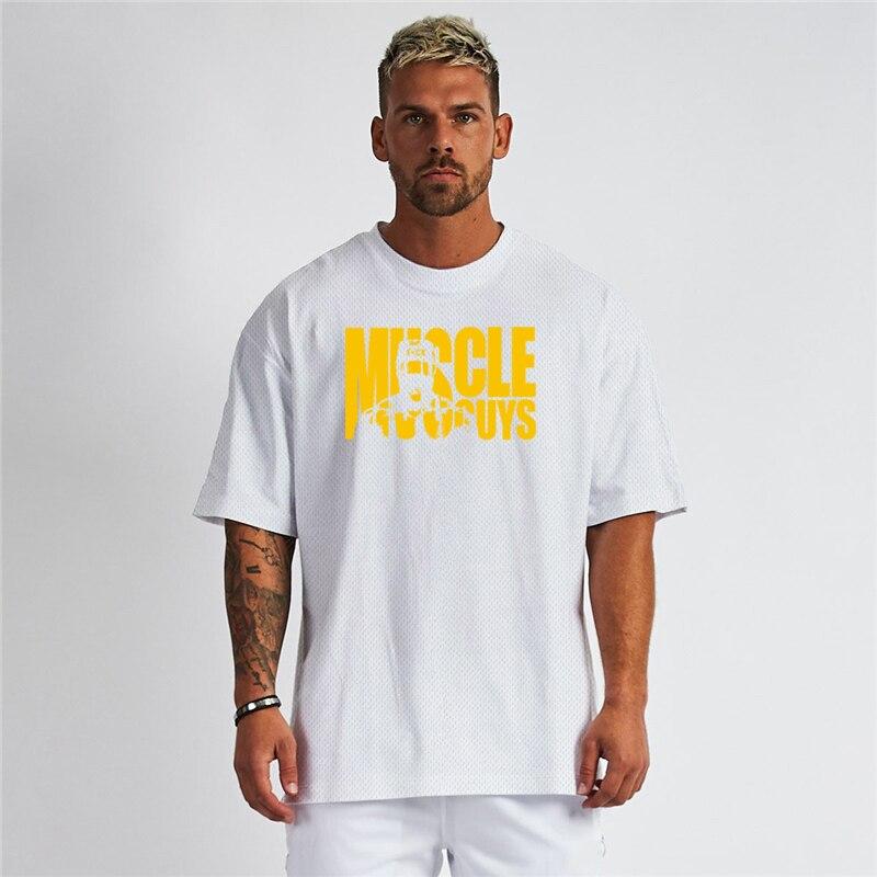 Muscleguys Summer Short Sleeved Men's Fitness Loose T-shirt  Round Neck Quick Drying Half Sleeve