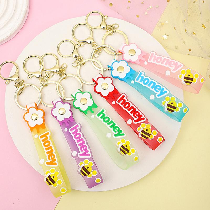 Transparent Pvc Soft Rubber Rope Keychain English Small Flower Jelly Color Plum Blossom Candy Color Drop Adhesive Wristband