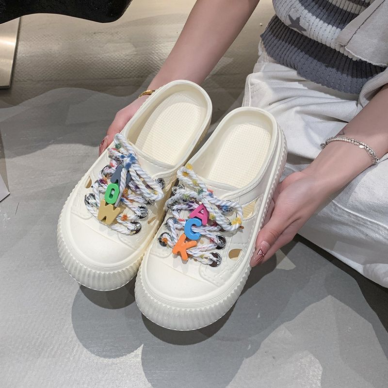 Soft bottom stepping on shit feeling wearing beach cool slippers women's 2025 summer new fashion versatile hole shoes thick sole