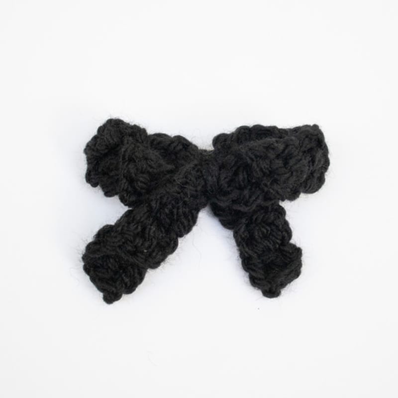 MERRYMOTIVE Flauschige Schleifen-Haarspange (schwarz)