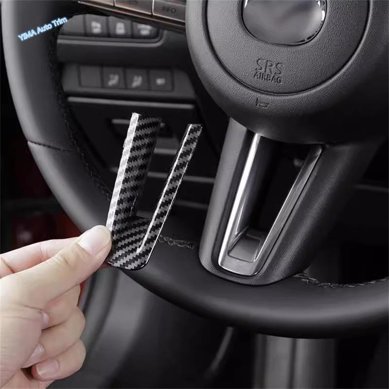 ABS Carbon Fiber Look / Red Car Steering Wheel Decoration Panel Cover Trim Fit For Toyota Corolla Cross - 2025 Accessories