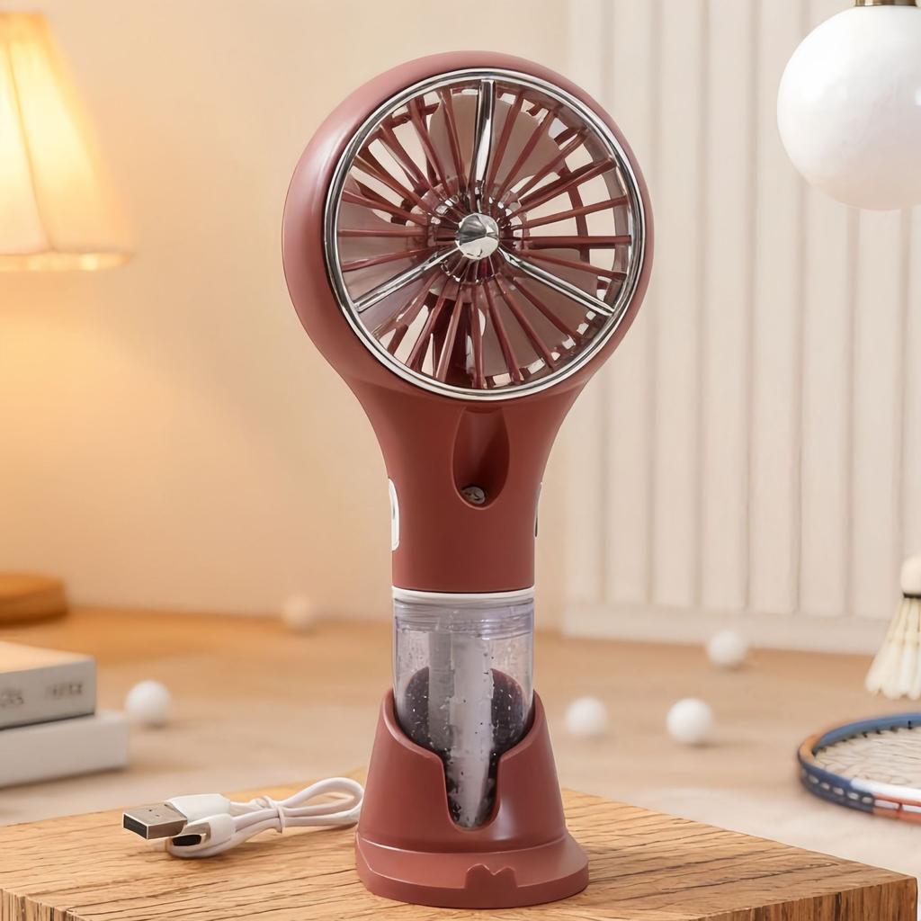Creative New Model Handheld with Base Spray Electric Fan for Outdoor Travel, Sun Protection, Hydration, and Infinitely Adjustable Speed.