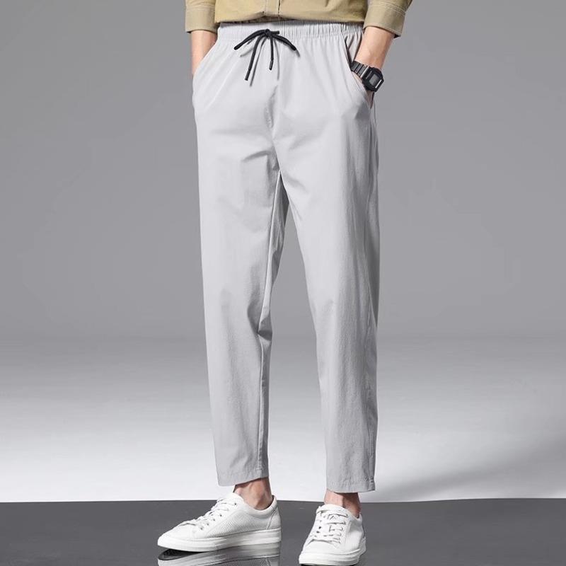 

Мужские летние модные брюки прямого покроя из быстросохнущего эластичного материала Ice Silk Slim Fit Nine Point. L светло-серый