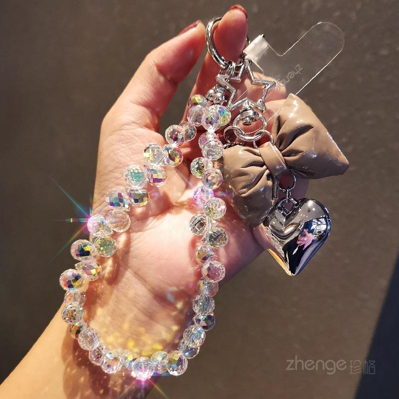 Small fragrance bow tie, love mobile phone hanging chain, ins mobile phone case, pendant, beaded chain, short fashion women's wrist ornament