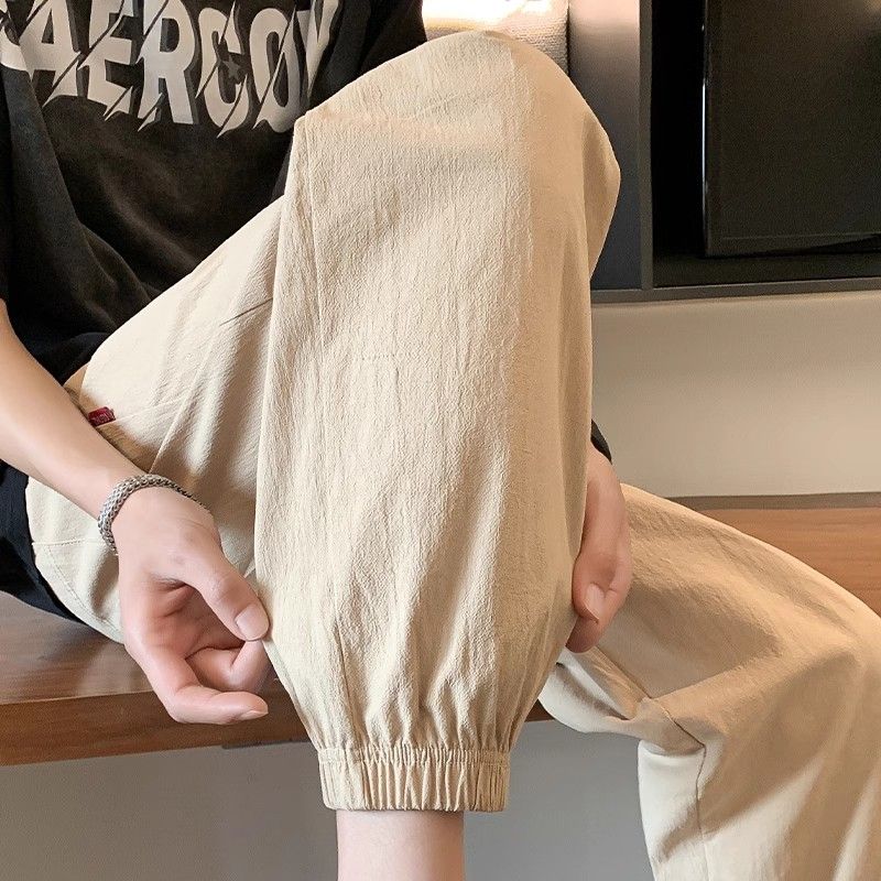 

Мужские повседневные брюки летние тонкие модные свободные на кулиске хлопково-льняные спортивные штаны укороченные 5XL хаки