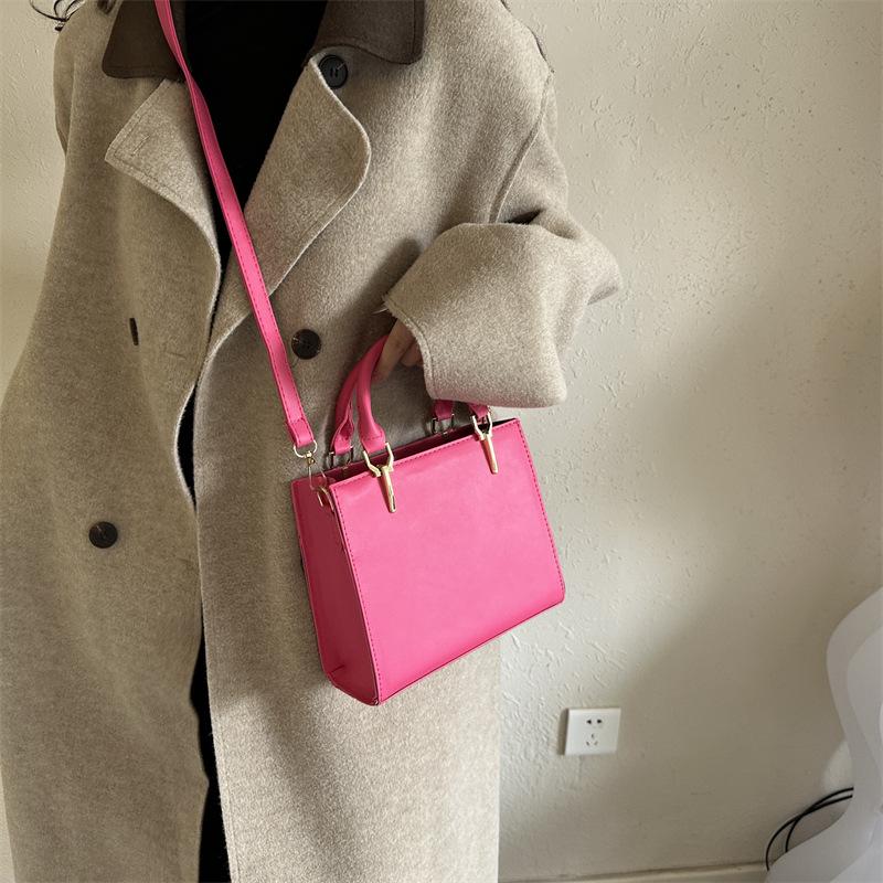 2024 Spring Women's Minimalist Crossbody Shoulder Bag - High-Quality, Fashionable, Versatile Handbag with Unique Stitching.