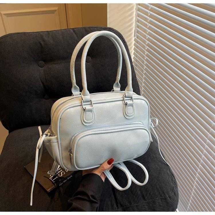 Niche design bag new fashion casual backpack women's hand retro shoulder pillow bag