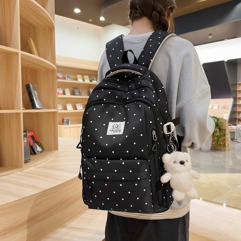 Einfacher Nylon-Rucksack mit Polka-Dots, niedliches Design, lässiger Schülerrucksack mit großem Fassungsvermögen und mehreren Fächern, geeignet für den täglichen Gebrauch und die Schule.