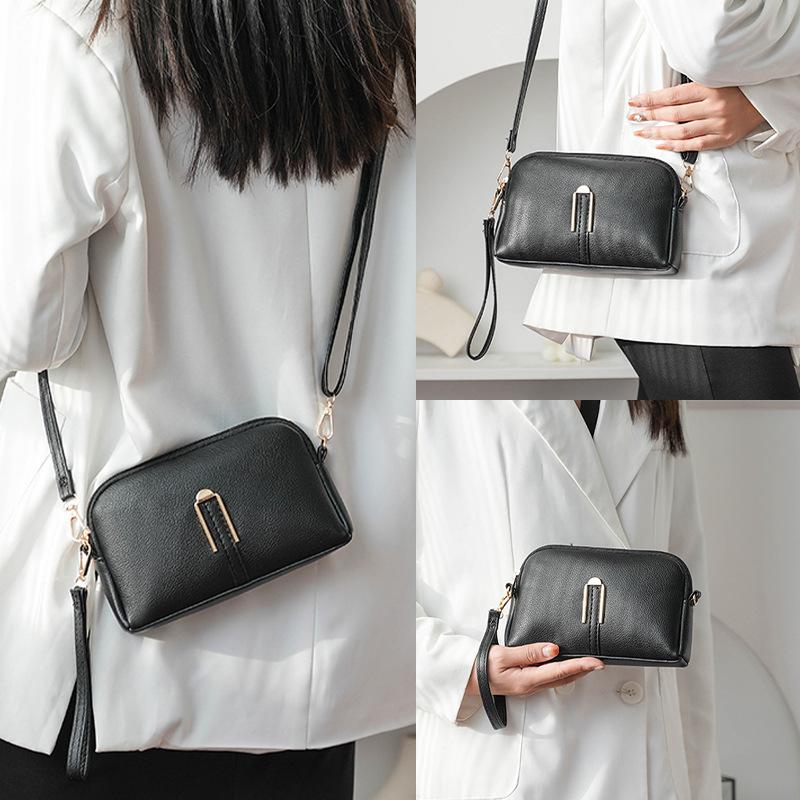 New Women's Bag Solid Color Hand held Mobile Phone Bag Korean Version Simple and Fashionable One Shoulder Crossbody Bag High End Small Bag
