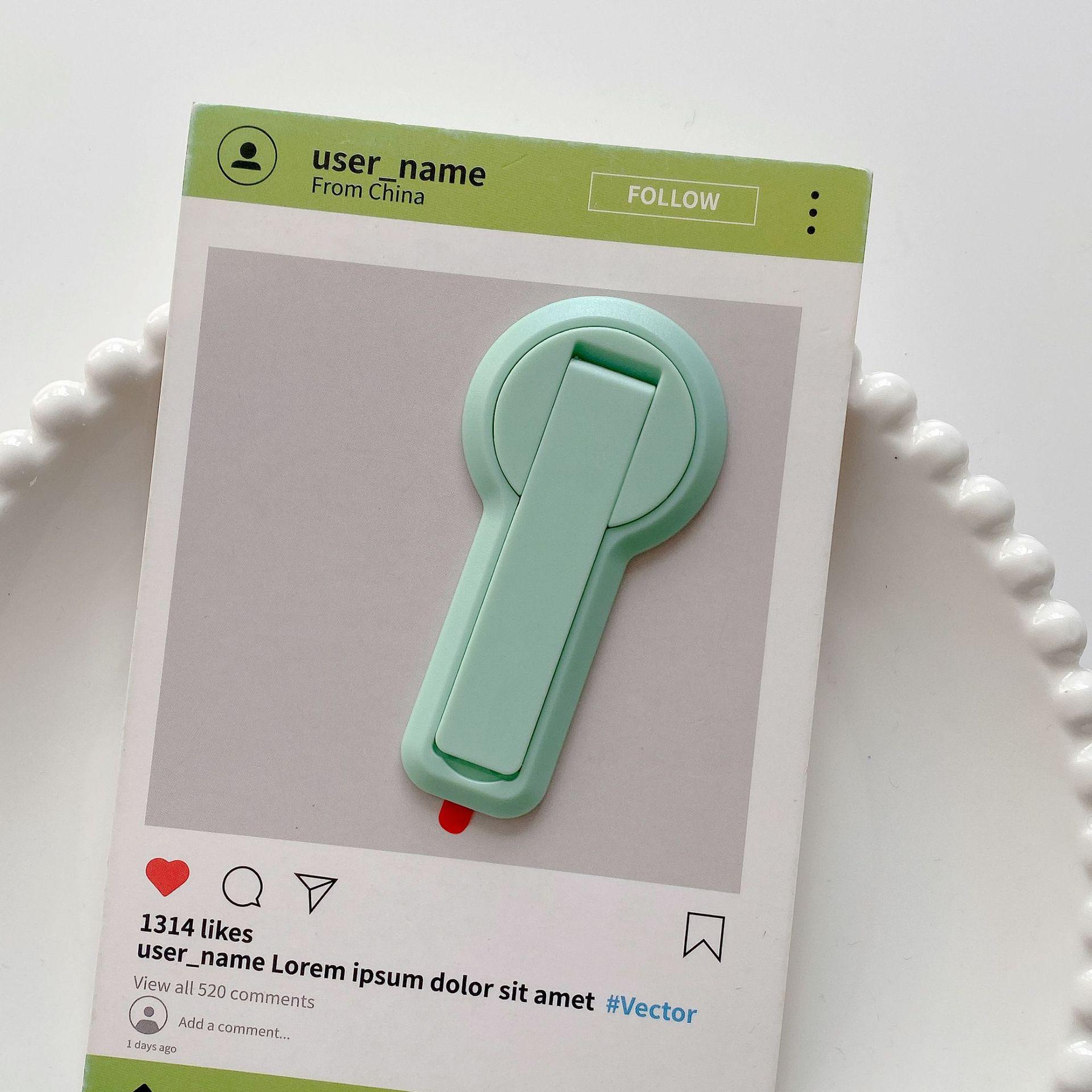 Invisible 360° Rotating Phone Holder: Adjustable Folding Adhesive for Desktop Use