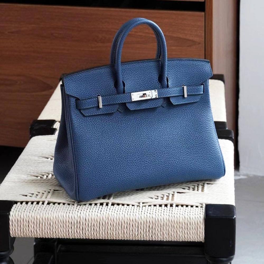 Høykvalitets spesiallaget semi-vokset tråd semi-håndsøm stålbeslag importert togo toppnarvet kuskinn håndveske med en følelse av luksus