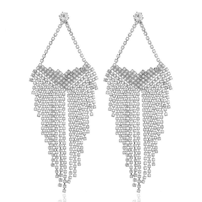 

Преувеличьте струящиеся серьги, длинные серьги, преувеличенный темперамент, модные легкие роскошные женские украшения для ушей. серебряный