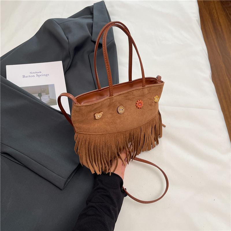 Autumn and winter high-end light luxury niche fringed bag women's new retro brown fashion portable messenger bag