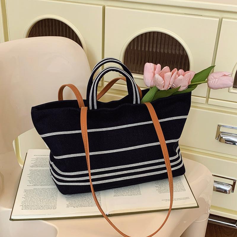 New niche design simple striped shopping bag tote bag portable shoulder trendy women's bag