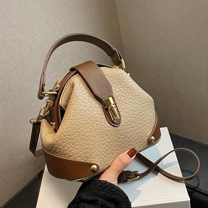 Luxury color-blocked crossbody bag, high-quality feel, stylish Western retro handbag, simple and suitable for commuting, elegant shoulder bag.