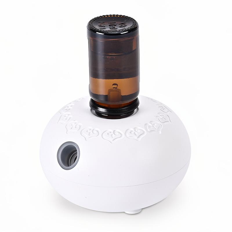 

Mini Rechargeable Aroma Diffuser - Portable, Silent, and Humidifying Aromatherapy for Car 46×75.5mm білий
