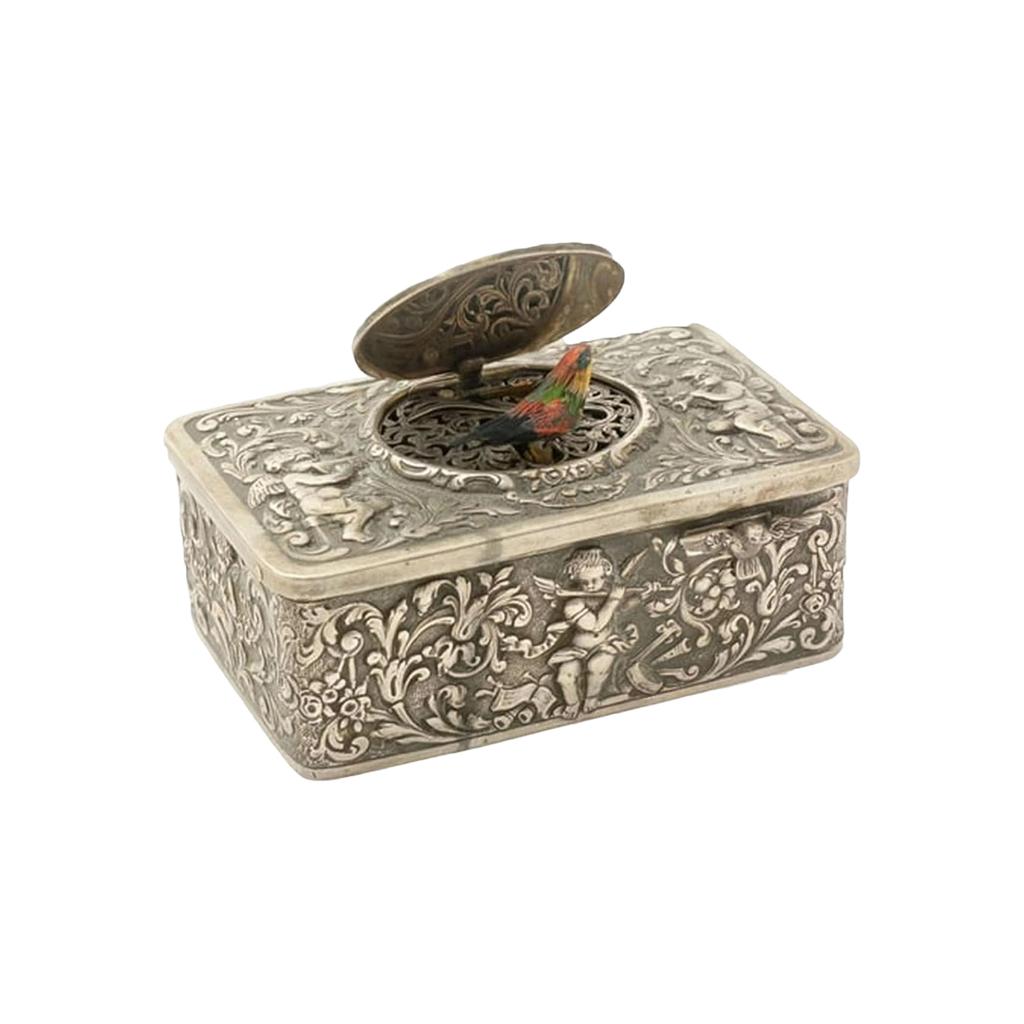 Gåvask i legering med automatisk uthoppande fågelform