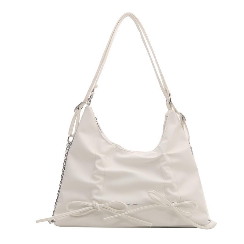 Modische Schmetterlingsschleife Große Kapazität Schultertasche 2024 Frühling Neuer Koreanischer Stil Street Trend Pu-Tragetasche