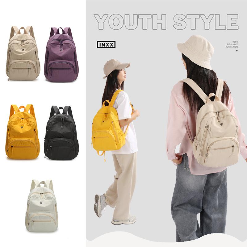 Schultasche Einfarbige Einfache Leichte Schultasche Rucksack für College-Studentinnen Tragbar Reise Wasserdicht Frühling High-School-Rucksack Männlich Lässig