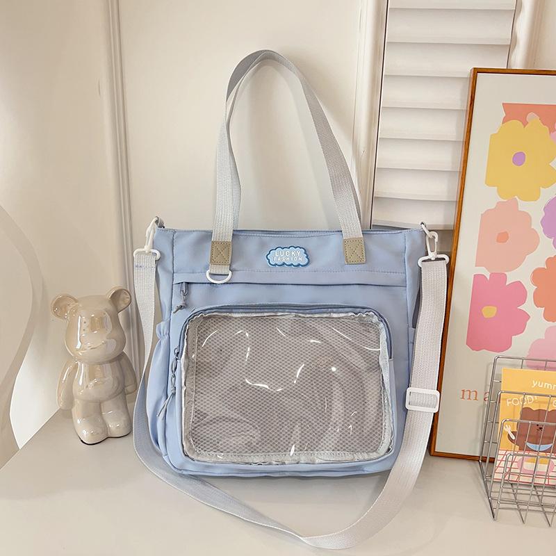 Japanische vielseitige hochwertige Umhängetasche im College-Stil, Soft-Girl-Tasche, Studenten-Make-up-Tasche, Schmerz-Tasche