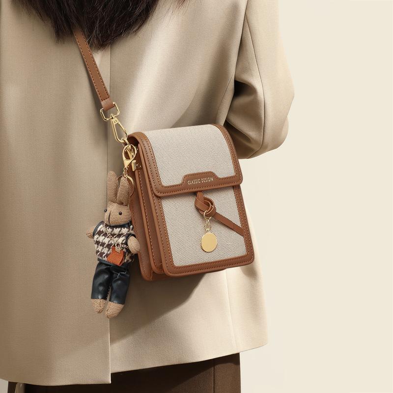 

Сумка для мобильного телефона женская 2025 новая темпераментная сумка-мессенджер универсальная ключевая легкая мини-сумка высокого класса