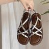 Neue gewebte Sandalen mit flachem Boden für Damen 2025 Sommer neue Oberbekleidung weiche Sohle mit lässigem Strand-Cool
