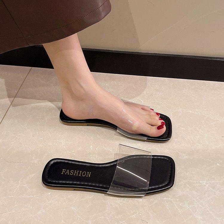 Xiaoxiangfeng Internet celebrity flat-bottomed slippers women's wear 2025 summer new versatile Korean version one-word transparent rhinestone slippers