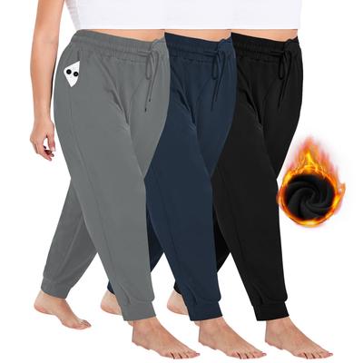 Spodnie sportowe plus size ze sznurkiem jesienno-zimowe damskie 1XL-5XL luźne ze ściągaczami do biegania w wolnym tempie ocieplane polarem