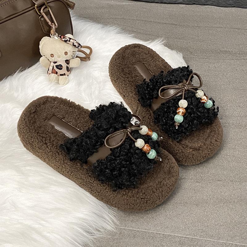 Bow thick-bottomed fluffy slippers for women's 2025 winter new outer wear one-word drag Internet celebrity plush cotton slippers atmosphere