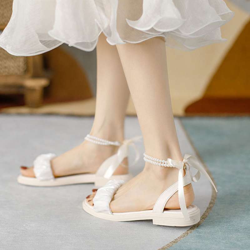 Sandals women's outer wear 2025 summer new versatile ins bow fairy style flat sandals non-slip maternity sandals