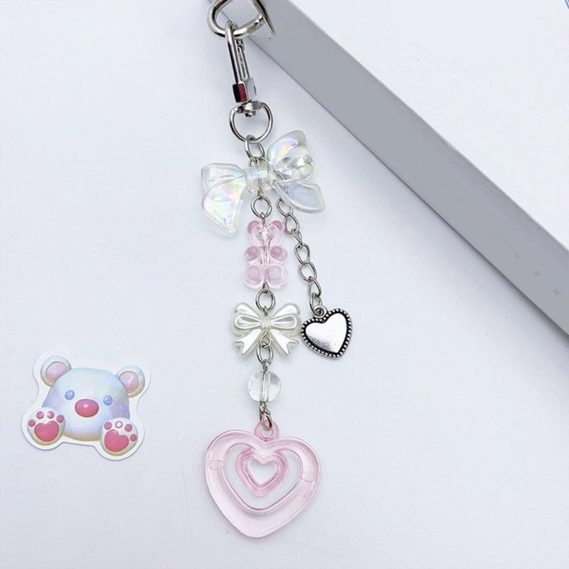 Modischer Herz-Schmetterling-Schleifenknoten-Anhänger Süßes Handy-Lanyard Taschen-Dekoration Tragbares Hänge-Lanyard für Mädchen Frauen