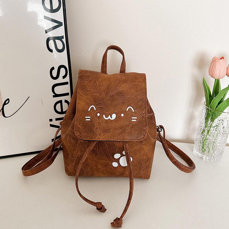 

Корейская версия бант двойной плечевой маленькая сумка женская 2025 новый модный модный рюкзак милая портативная сумка через плечо школьная сумка коричневый