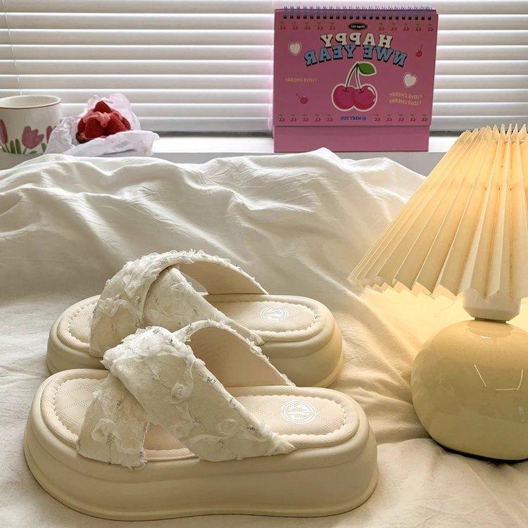 Foreign style fairy slippers female outer wear 2025 summer new one-pedal flower cross with thick-bottomed beach cool slippers