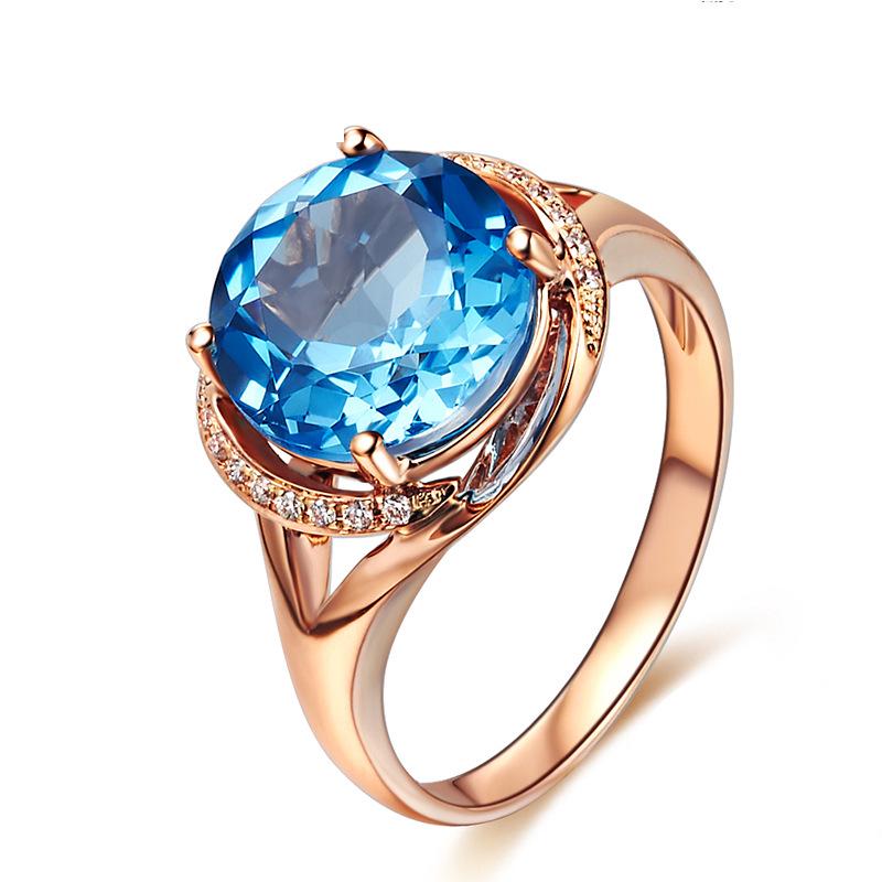 Adjustable Swiss Blue Topaz Ring in 18K Rose Gold Plating - Women's Engagement Jewelry
