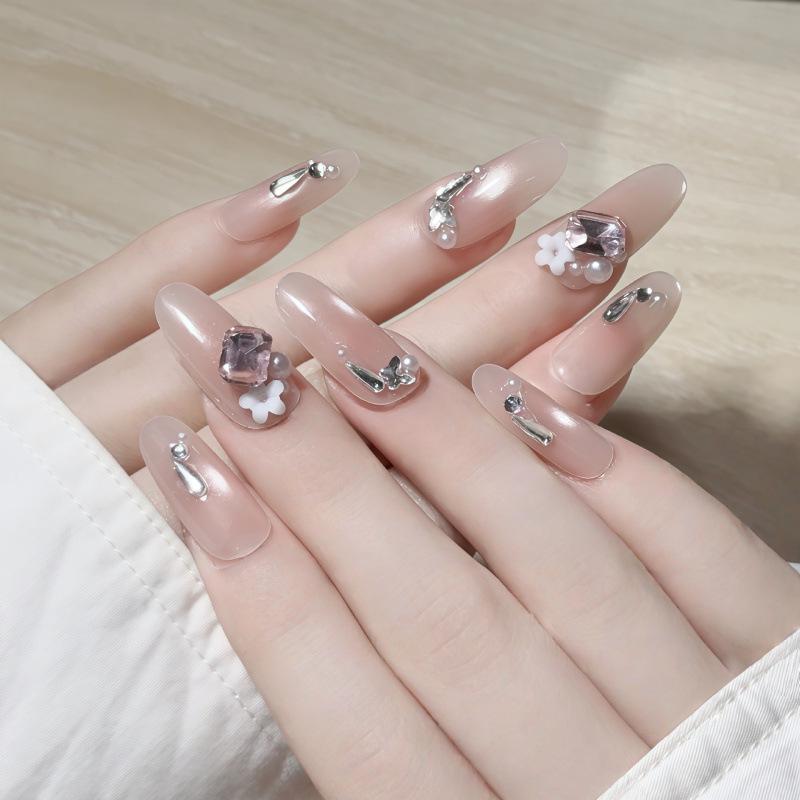 Fairy-Touch Translucent Nude Gradient Press-On Nails with Pink Diamond, Silver Accents, and Small Flowers - Removable & Gentle.