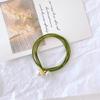 Elegant Korean Pearl Knot Hair Tie - High Elasticity Rubber Band Accessory.