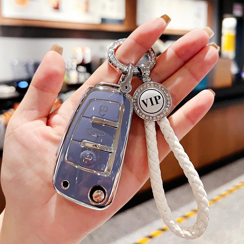 Chery Key Case for Tiggo 3x, Arrizo 5, and QQ Ice Cream - High-End Protective Shell with Buckle for Women.