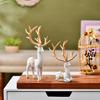 Charming Polyresin Reindeer Décor | A Timeless Token of Grace & Good Luck | Elevate Your Festive & Everyday Spaces – Pack of 2, White & Golden