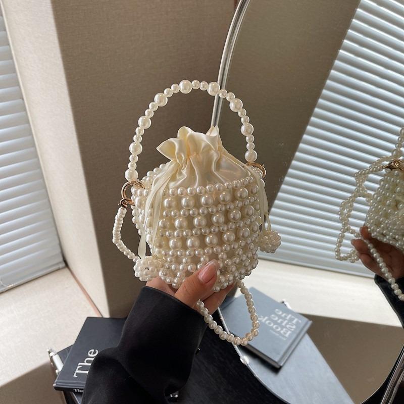 Modetrend lässige Textur einfache Bucket Bag Frühling und Sommer neu Nische Damen Schulter Umhängetasche