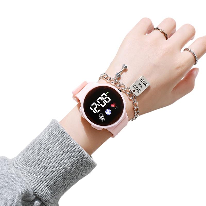 

Popular And Stylish Round Electronic Watch For Children With Space Man Design High Tech And Trendy StyleD