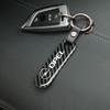 Auto Kohlefaser Schlüsselanhänger Luxus Schlüsselring Zubehör für Opel Astra Grandland Corsa Mokka Frontera Insignia Zafira Vivaro Karl