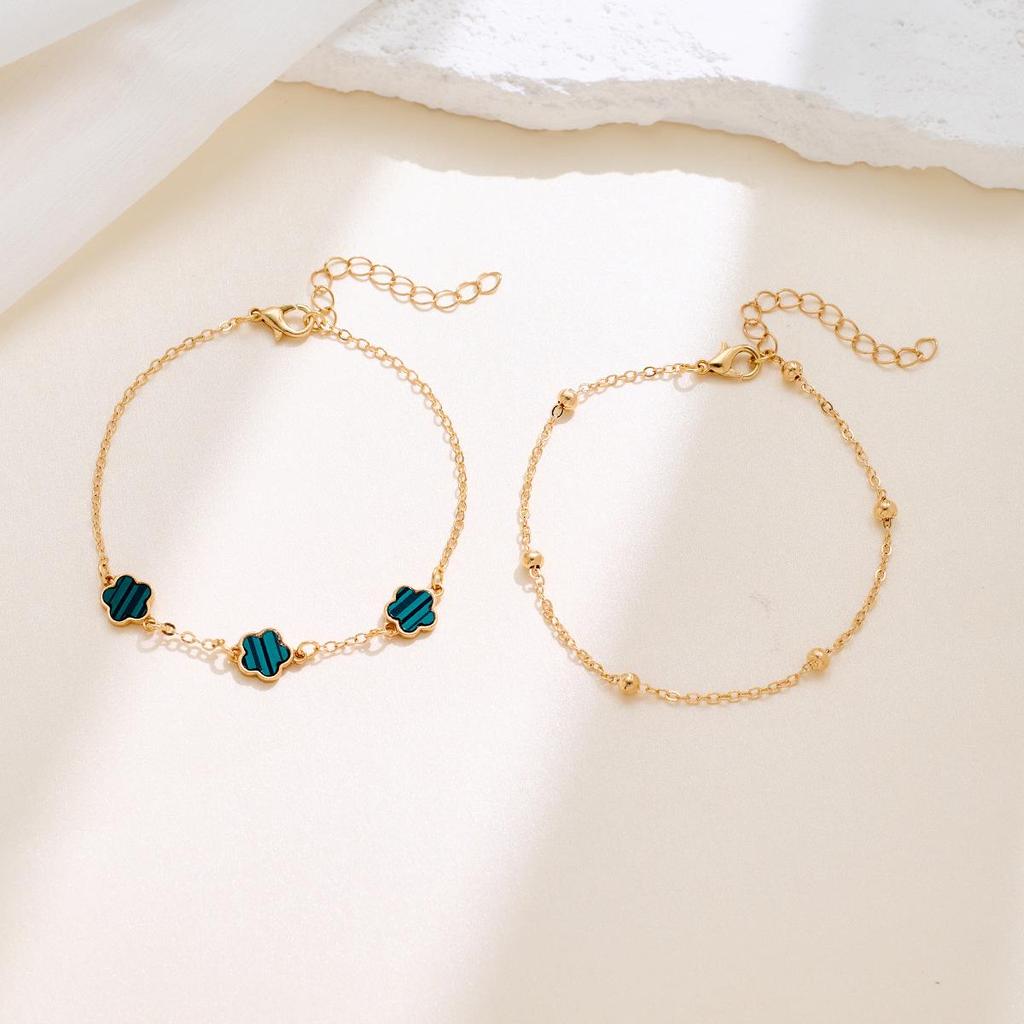 Koreaanse Stijl 4-delige Sieradenset: Bloemenarmband, Ring, Oorbellen met Stud & Klavertje Vier Ketting